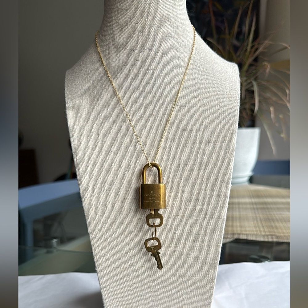 Louis Vuitton Lock #317 with 2 Matching Keys on GoldTone Chain Necklace.